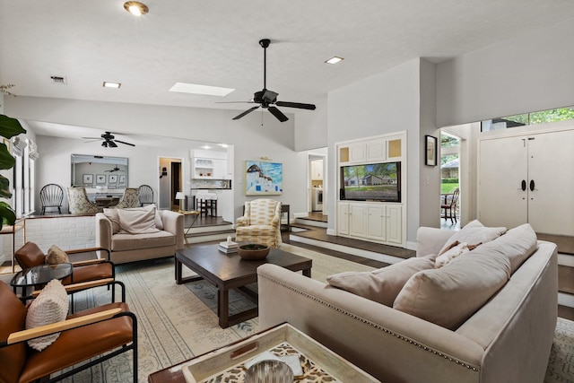 9402 Spring Hollow Dr, Dallas, TX 75243 - living room with a ceiling fan and high vaulted ceiling