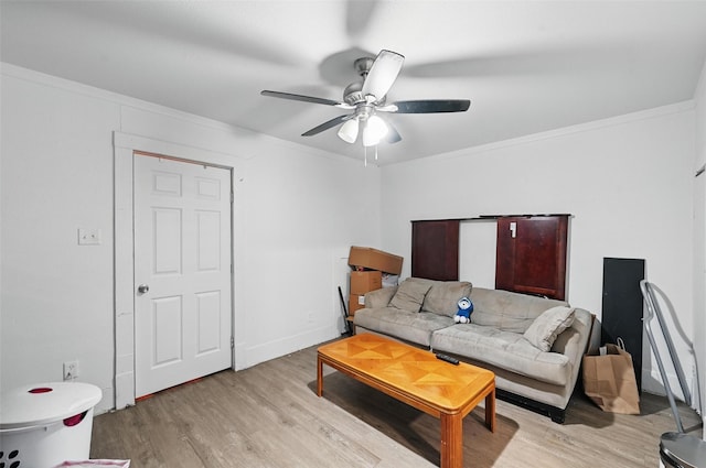 3950 Lisbon St, Fort Worth, TX 76107 - living area featuring light wood-style flooring, ornamental molding, ceiling fan, and baseboards