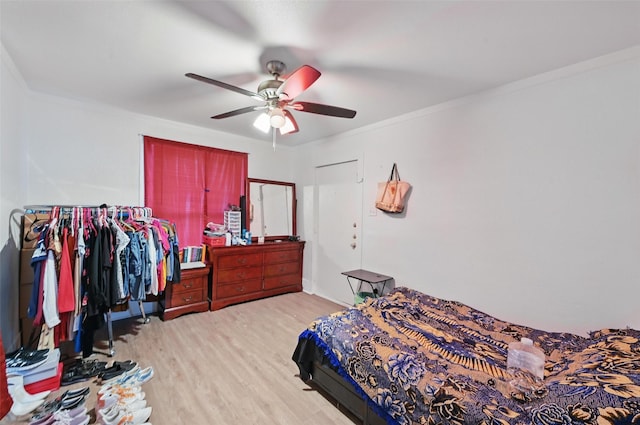 3950 Lisbon St, Fort Worth, TX 76107 - bedroom with light wood-style floors, a ceiling fan, and ornamental molding