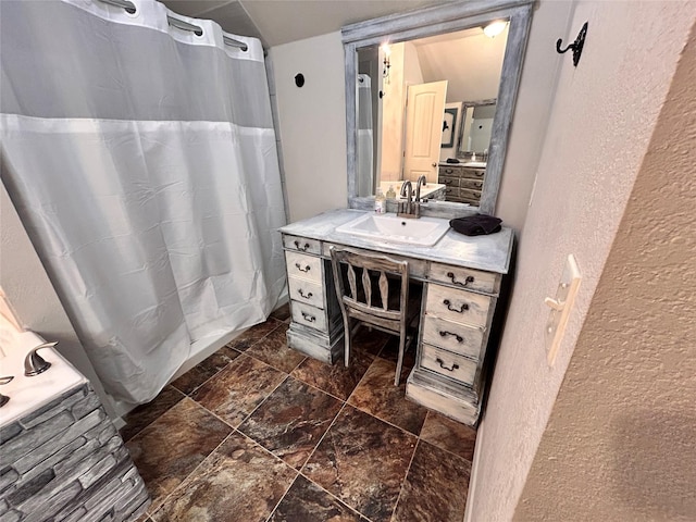 155 Saint Andrews Rd, Amarillo, TX 79118 - bathroom with vanity, a textured wall, and a shower with shower curtain