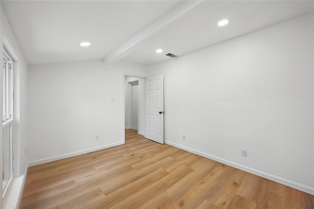 512 Shadowbrook Ln, Hurst, TX 76053 - unfurnished bedroom featuring beamed ceiling, light wood-style flooring, baseboards, and recessed lighting