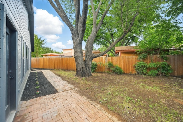 512 Shadowbrook Ln, Hurst, TX 76053 - fenced backyard featuring a patio area