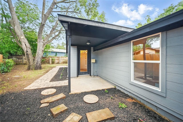 512 Shadowbrook Ln, Hurst, TX 76053 - property entrance featuring a patio area