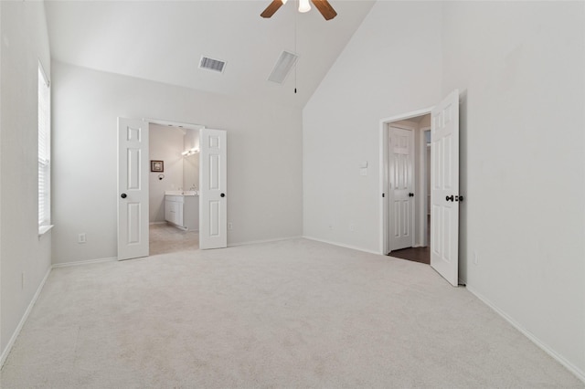 2125 Garden Crest Dr, Rockwall, TX 75087 - unfurnished bedroom with high vaulted ceiling, carpet floors, baseboards, ensuite bath, and a ceiling fan