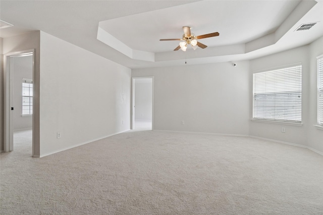2125 Garden Crest Dr, Rockwall, TX 75087 - unfurnished room with a ceiling fan, a raised ceiling, carpet floors, and baseboards