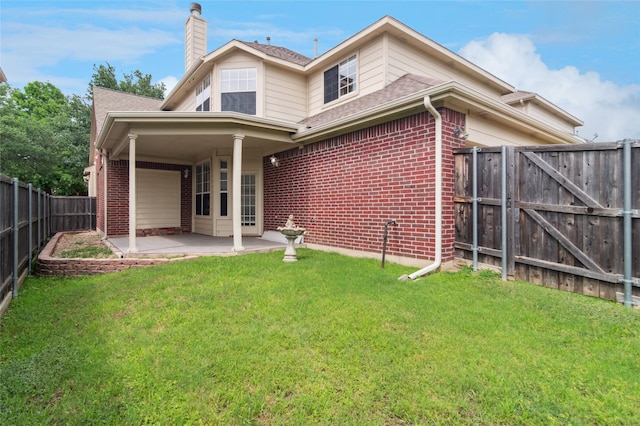 2125 Garden Crest Dr, Rockwall, TX 75087 - back of house with brick siding, a patio area, a chimney, roof with shingles, and a gate