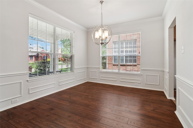 2125 Garden Crest Dr, Rockwall, TX 75087 - spare room with a chandelier, healthy amount of natural light, dark wood-type flooring, ornamental molding, and wainscoting