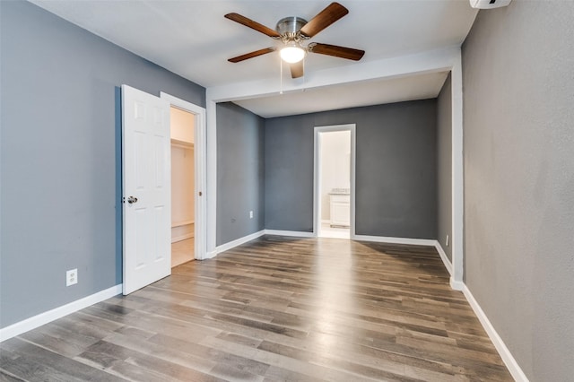 1415 Swiss St, Arlington, TX 76010 - unfurnished bedroom featuring wood finished floors, ensuite bathroom, baseboards, and ceiling fan