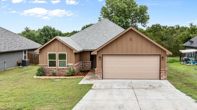 2615 San Gabriel Dr, Granbury, TX 76048 - view of front of home with brick siding, roof with shingles, board and batten siding, central air condition unit, and driveway