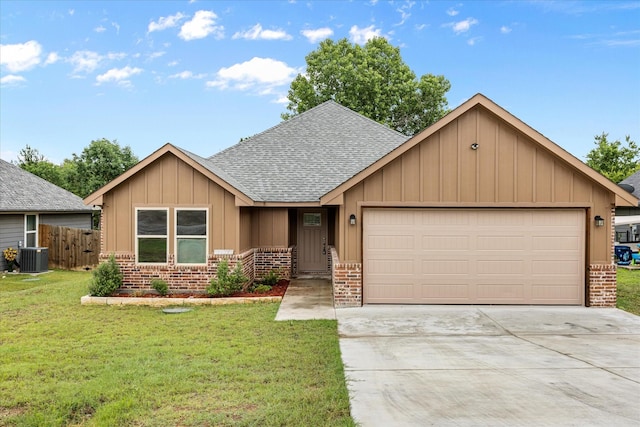 2615 San Gabriel Dr, Granbury, TX 76048 - single story home featuring brick siding, a shingled roof, an attached garage, and board and batten siding