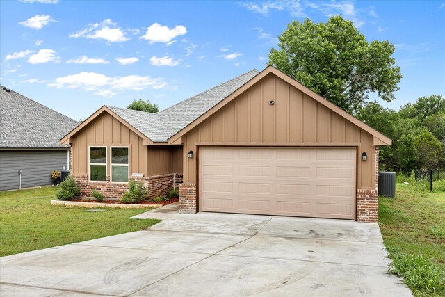 2615 San Gabriel Dr, Granbury, TX 76048 - view of front of property featuring brick siding, a shingled roof, board and batten siding, driveway, and an attached garage