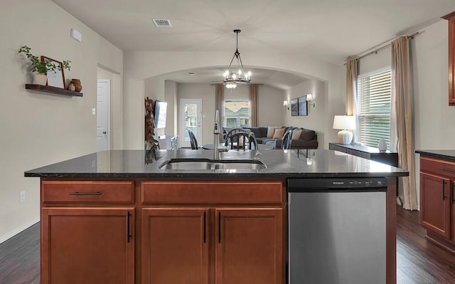 3200 Keathley Dr, Waco, TX 76655 - kitchen featuring stainless steel dishwasher, arched walkways, a sink, open floor plan, and healthy amount of natural light