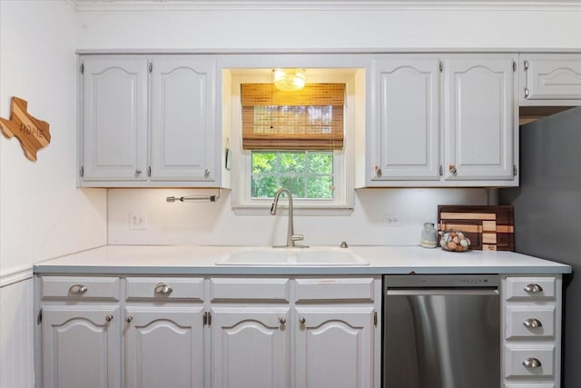 7844 Fairway Rd, Woodway, TX 76712 - kitchen featuring appliances with stainless steel finishes, a sink, and light countertops
