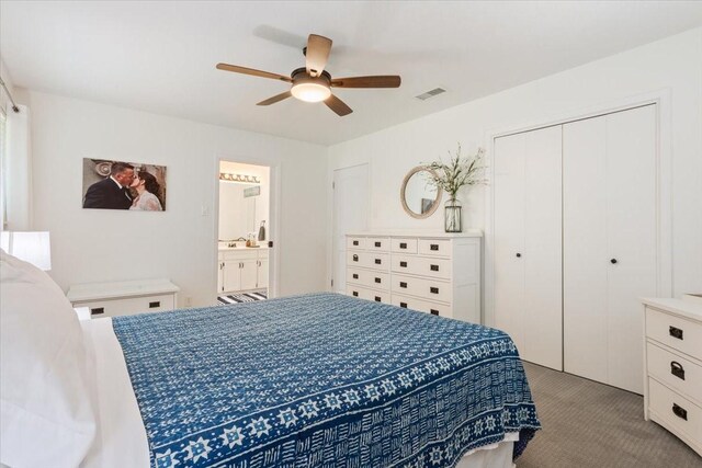 7844 Fairway Rd, Woodway, TX 76712 - bedroom featuring carpet floors, a closet, a ceiling fan, and connected bathroom