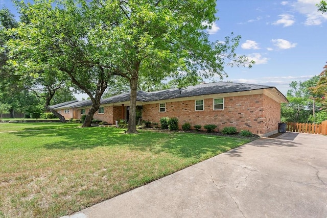7844 Fairway Rd, Woodway, TX 76712 - view of front of house featuring brick siding and driveway