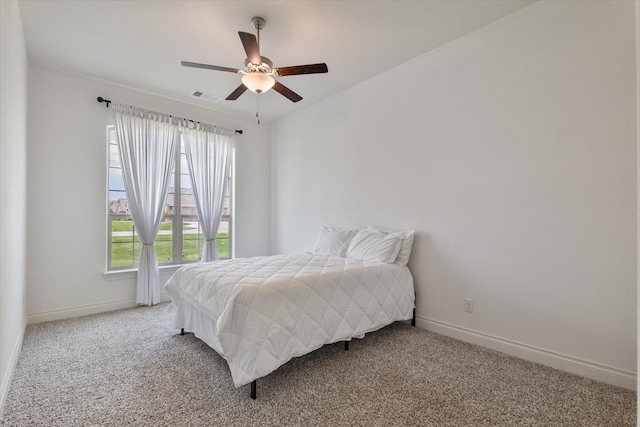 108 Kingwood Dr, Krugerville, TX 76227 - bedroom with carpet flooring, baseboards, and a ceiling fan