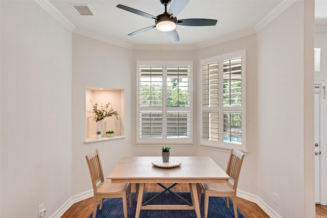 2403 Legend Dr, Heath, TX 75032 - dining room featuring a ceiling fan, wood finished floors, ornamental molding, and baseboards