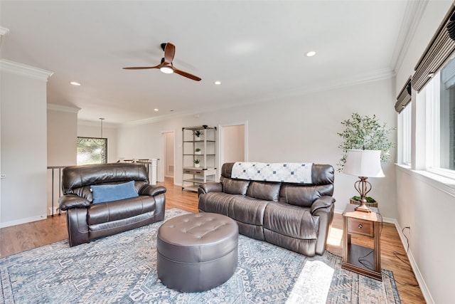 2403 Legend Dr, Heath, TX 75032 - living room with wood finished floors, a ceiling fan, recessed lighting, ornamental molding, and baseboards