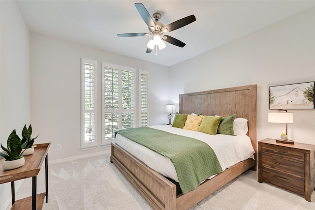2403 Legend Dr, Heath, TX 75032 - bedroom with light colored carpet, baseboards, and ceiling fan