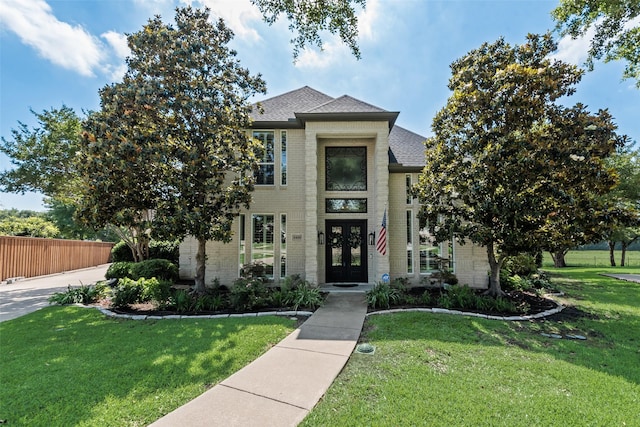 2403 Legend Dr, Heath, TX 75032 - view of front of home with french doors, brick siding, and a shingled roof