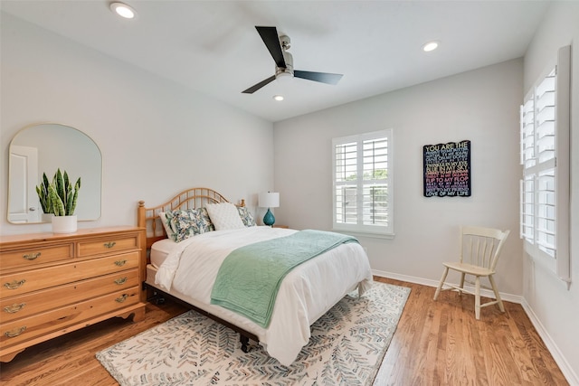 2403 Legend Dr, Heath, TX 75032 - bedroom with light wood-type flooring, recessed lighting, baseboards, and ceiling fan