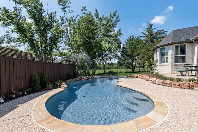2403 Legend Dr, Heath, TX 75032 - view of swimming pool with a fenced backyard and a patio area
