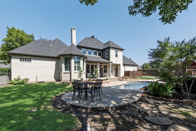 2403 Legend Dr, Heath, TX 75032 - rear view of property with a patio area, a chimney, and brick siding