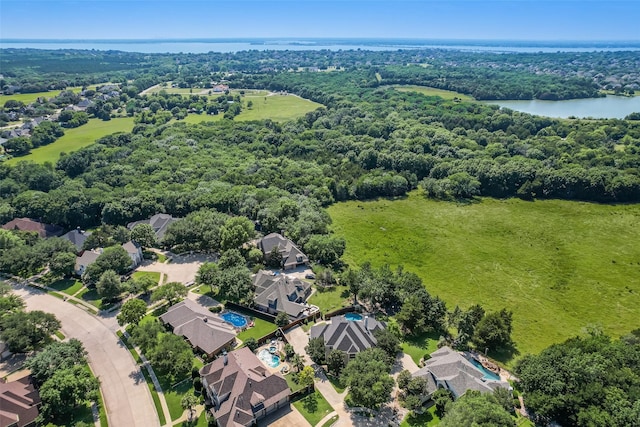 2403 Legend Dr, Heath, TX 75032 - aerial perspective of suburban area with a nearby body of water and a forest