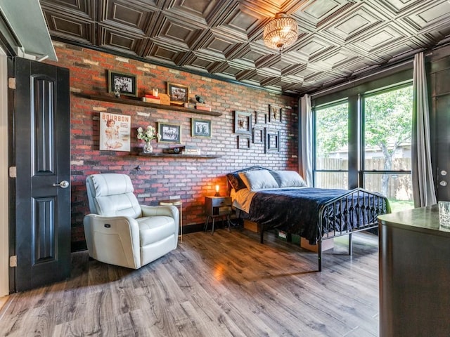 3033 Maple Creek Dr, Fort Worth, TX 76177 - bedroom with an ornate ceiling, brick wall, and wood finished floors