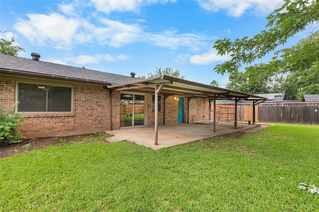 3209 N Calais St, Sherman, TX 75090 - back of house featuring brick siding and a patio area