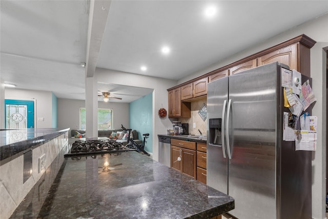 3209 N Calais St, Sherman, TX 75090 - kitchen featuring stainless steel appliances, ceiling fan, recessed lighting, dark stone counters, and backsplash