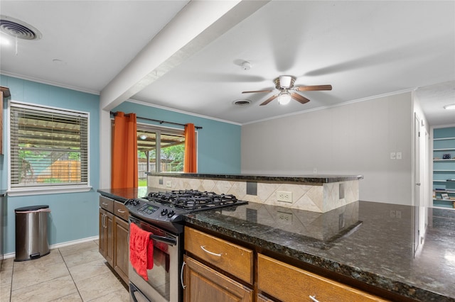 3209 N Calais St, Sherman, TX 75090 - kitchen featuring gas stove, ornamental molding, backsplash, ceiling fan, and light tile patterned flooring