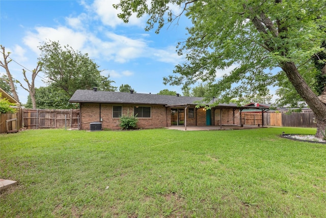 3209 N Calais St, Sherman, TX 75090 - back of property with a patio, brick siding, and central air condition unit
