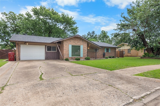 3209 N Calais St, Sherman, TX 75090 - single story home with an attached garage, brick siding, and concrete driveway