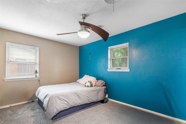 3209 N Calais St, Sherman, TX 75090 - carpeted bedroom with baseboards and a ceiling fan