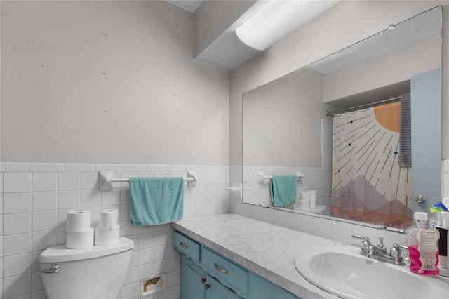 3209 N Calais St, Sherman, TX 75090 - full bath with toilet, vanity, curtained shower, tile walls, and a wainscoted wall