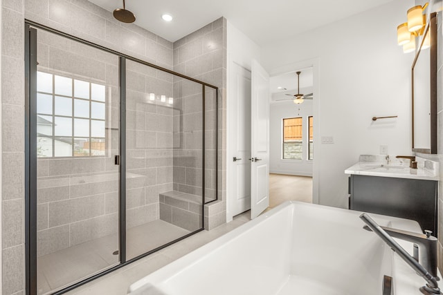 14085 Nicollet Dr, Frisco, TX 75033 - full bath featuring a shower stall, vanity, a bath, ceiling fan, and recessed lighting