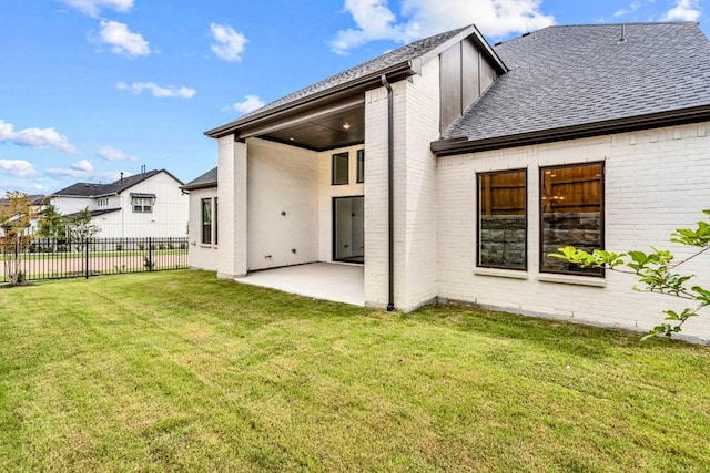 14085 Nicollet Dr, Frisco, TX 75033 - rear view of property with brick siding, a patio, and a shingled roof