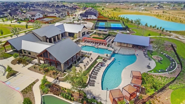 14085 Nicollet Dr, Frisco, TX 75033 - aerial perspective of suburban area featuring a pool and a nearby body of water