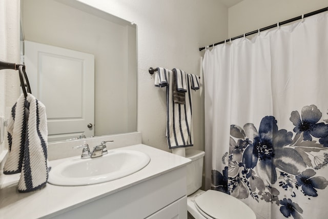 1421 Ancer Way, Fort Worth, TX 76052 - bathroom featuring toilet, vanity, and a shower with curtain