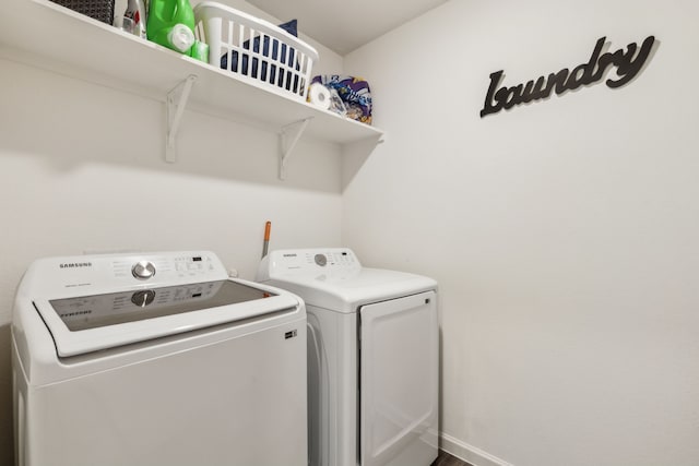 1421 Ancer Way, Fort Worth, TX 76052 - laundry area with separate washer and dryer and baseboards
