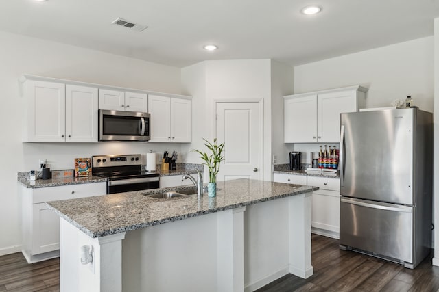 1421 Ancer Way, Fort Worth, TX 76052 - kitchen featuring stainless steel appliances, dark wood-type flooring, white cabinetry, a sink, and recessed lighting