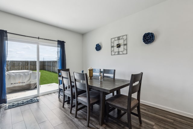 1421 Ancer Way, Fort Worth, TX 76052 - dining area featuring dark wood-style floors and baseboards