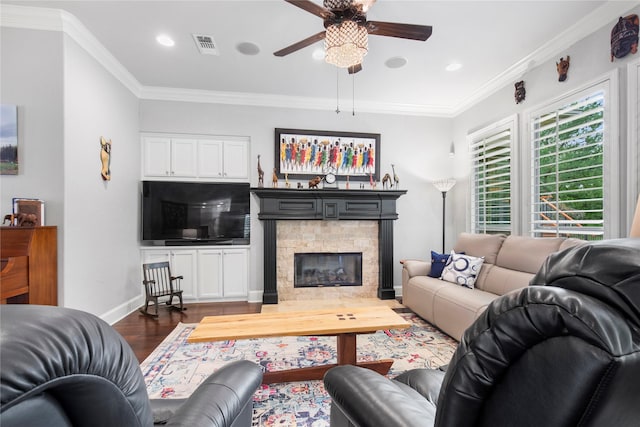 3042 Preston Club Dr, Sherman, TX 75092 - living room with a ceiling fan, dark wood finished floors, baseboards, a stone fireplace, and ornamental molding