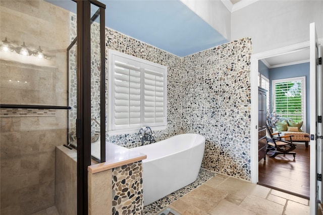 3042 Preston Club Dr, Sherman, TX 75092 - full bathroom featuring crown molding, a soaking tub, a stall shower, and stone tile flooring