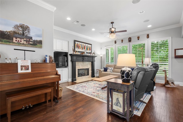 3042 Preston Club Dr, Sherman, TX 75092 - living room with a ceiling fan, healthy amount of natural light, dark wood finished floors, ornamental molding, and recessed lighting