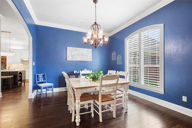 3042 Preston Club Dr, Sherman, TX 75092 - dining room with a textured wall, ornamental molding, dark wood-style floors, a chandelier, and baseboards