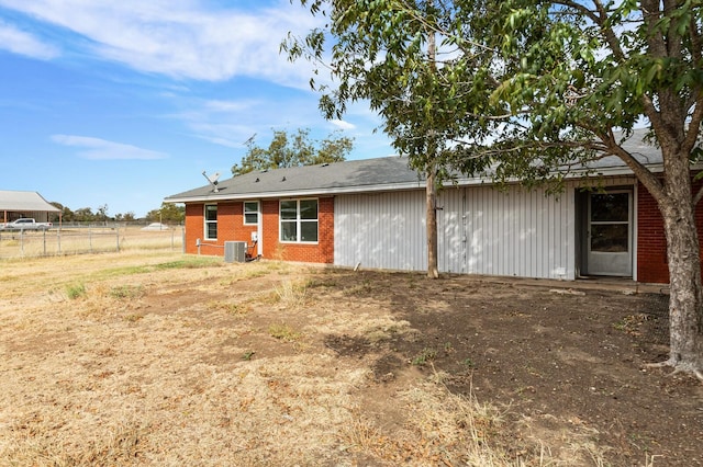 281 Lakeside Dr, China Spring, TX 76633 - back of house with central AC and brick siding