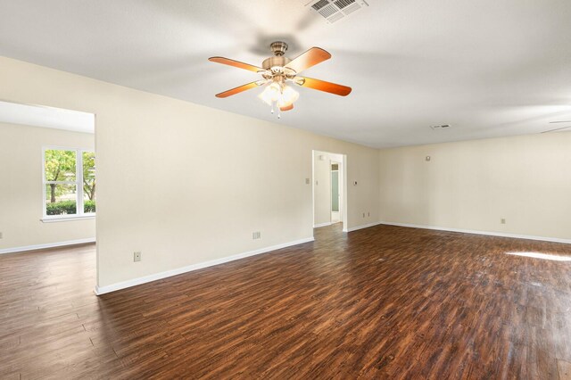 281 Lakeside Dr, China Spring, TX 76633 - spare room featuring dark wood-style flooring, ceiling fan, and baseboards
