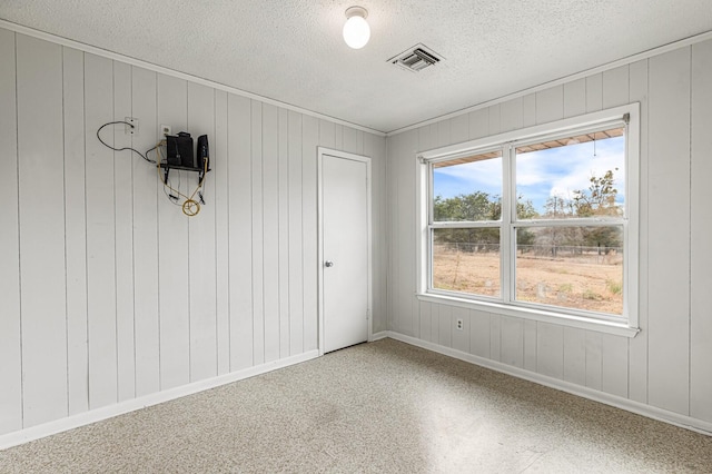 281 Lakeside Dr, China Spring, TX 76633 - unfurnished room featuring a textured ceiling and baseboards